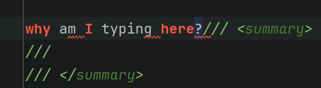 The same XMLDOC as above, the words "why amI typing here" now appear to the left of the comment body and have intellisense error highlighting.